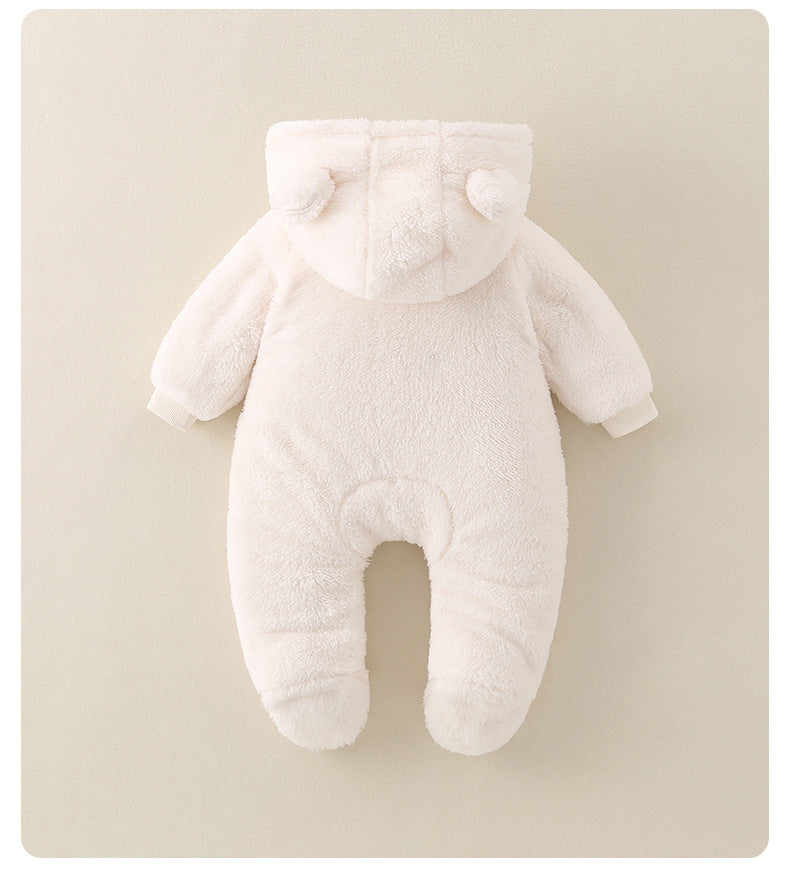 White plush toy on a beige background