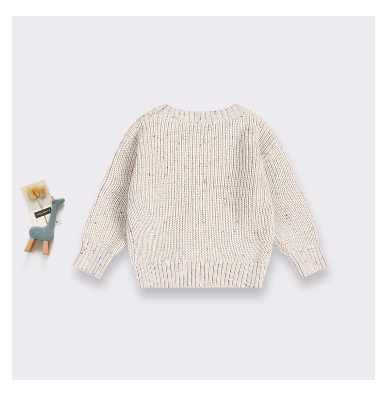 Beige knitted sweater on a white background