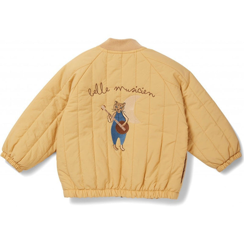 Yellow quilted jacket with a bear playing guitar design and 'belle musicien' text on a white background