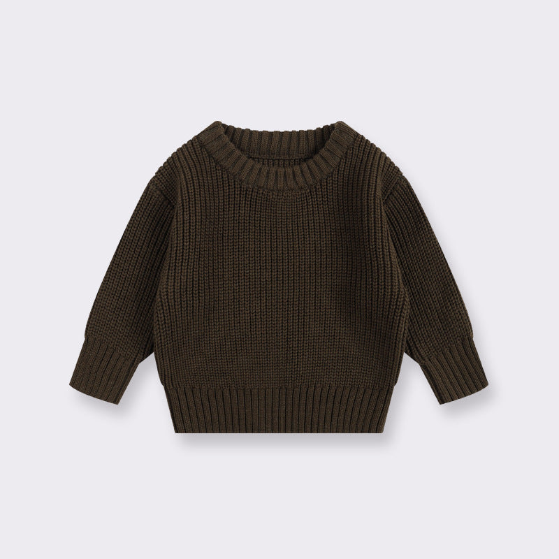 Brown knitted sweater on a light gray background