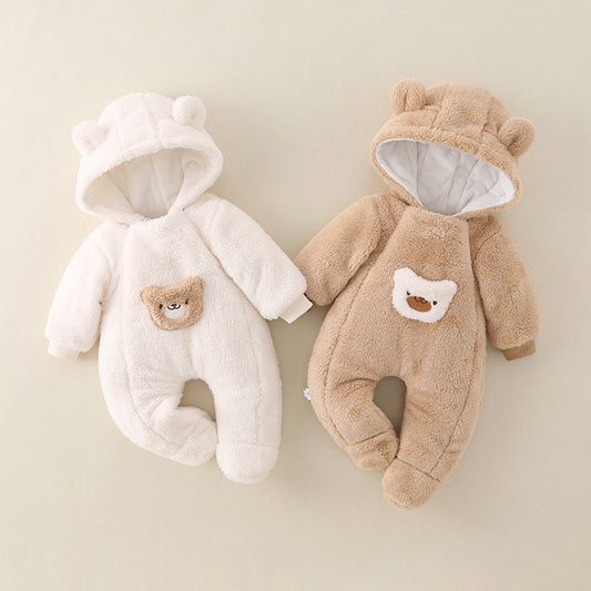 Two baby pramsuit, one white and one brown, with bear face designs on a beige background.