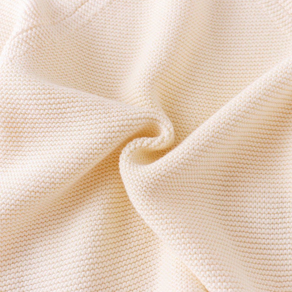 Close-up of beige fabric with a soft texture